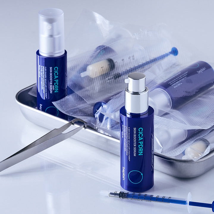 BEPLAIN Cica PDRN Skin Booster Serum 30ml bottles in a medical tray with syringes and packaging