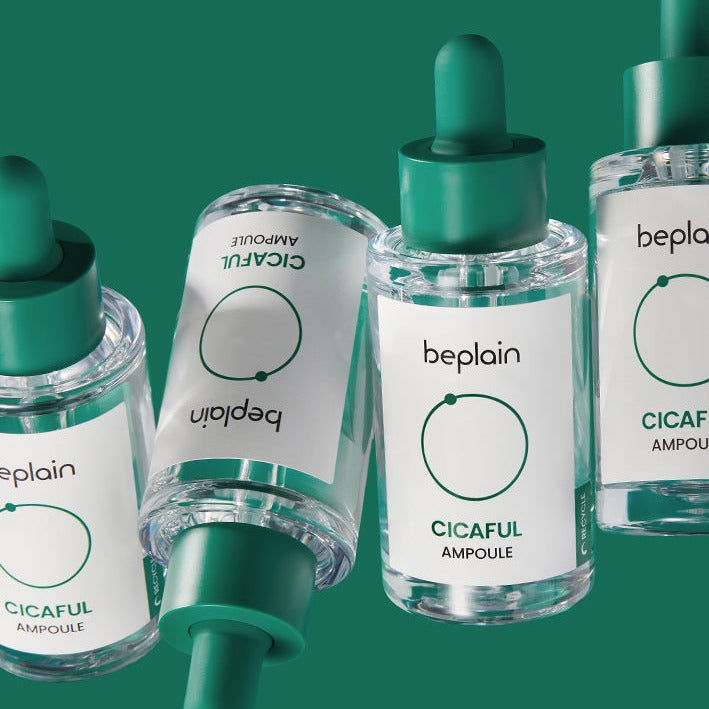 BEPLAIN Cicaful Ampoule bottles on a green background, showcasing skincare serum packaging design.
