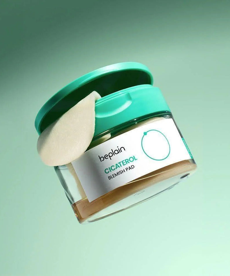 BEPLAIN Cicaterol Blemish Pad 80 sheets in green container with open lid for skincare treatment.