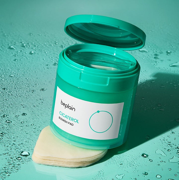 BEPLAIN Cicaterol Blemish Pad 80 sheets displayed with open lid on a teal background