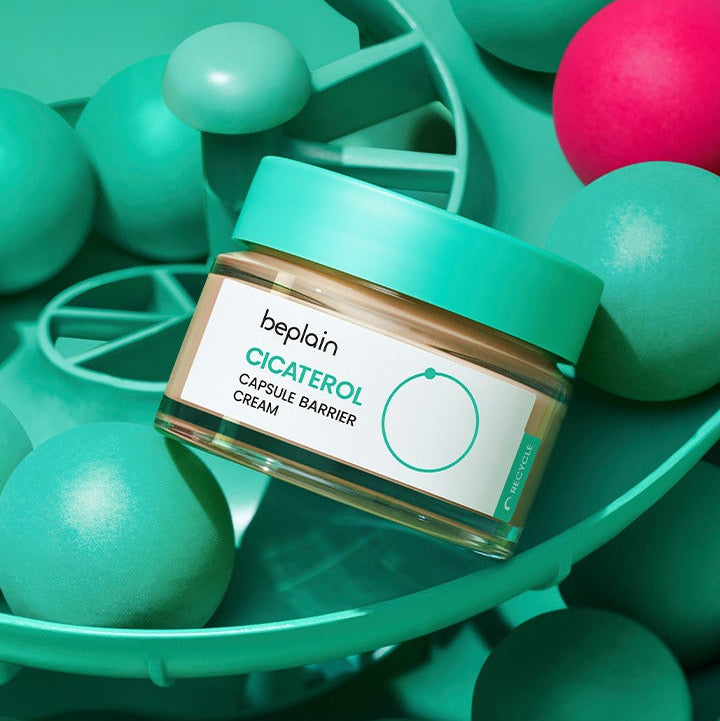 BEPLAIN Cicaterol Capsule Barrier Cream 50ml jar on green background with decorative elements