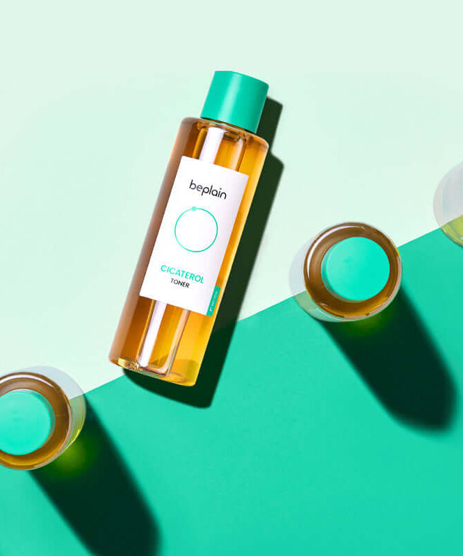 BEPLAIN Cicaterol Toner product bottle on a green background, highlighting the skincare toner for soothing and hydrating the skin.