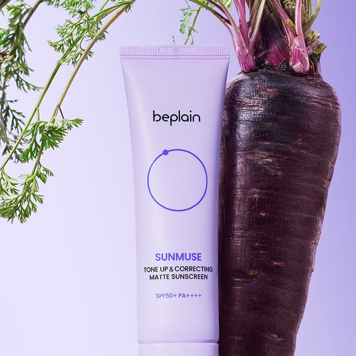 BEPLAIN Sunmuse Toneup & Correting Matte Sunscreen SPF50+ PA++++ 50ml showcased with a purple carrot