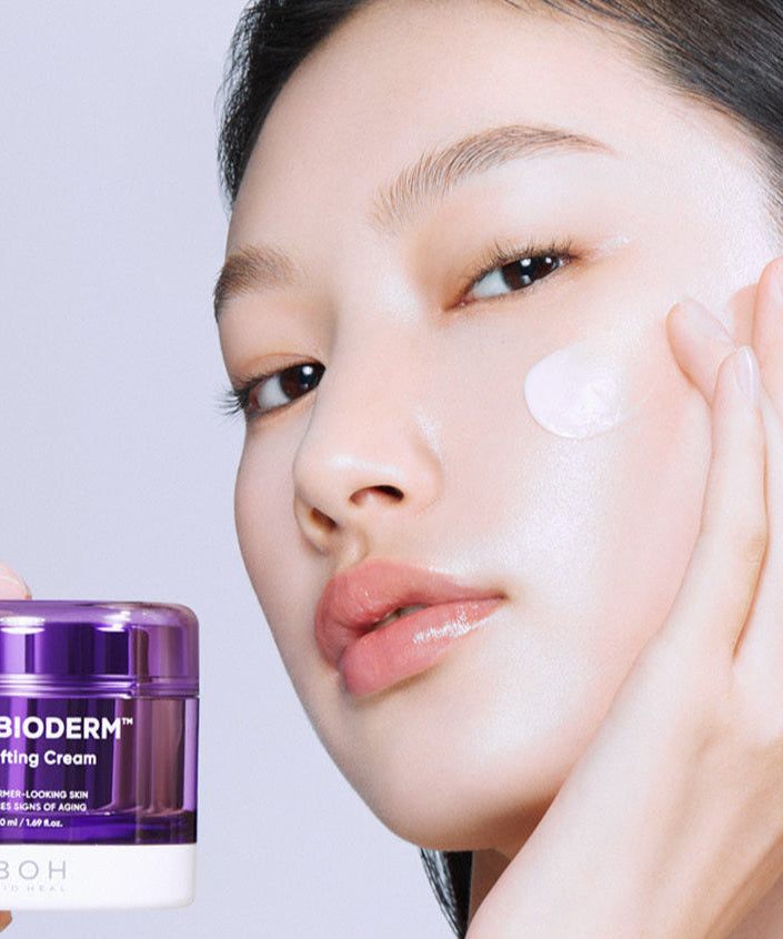 Woman applying BIO HEAL BOH Probioderm 3D Lifting Cream 50ml on her face for skin rejuvenation and lifting effect.