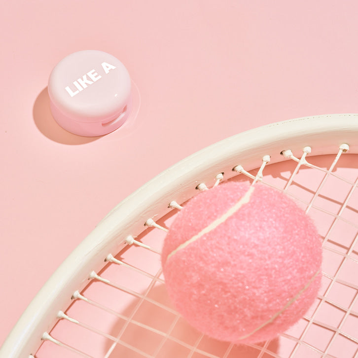 BLESSED MOON Mini Like A Shadow product showcasing pink tennis ball and cap on a racket