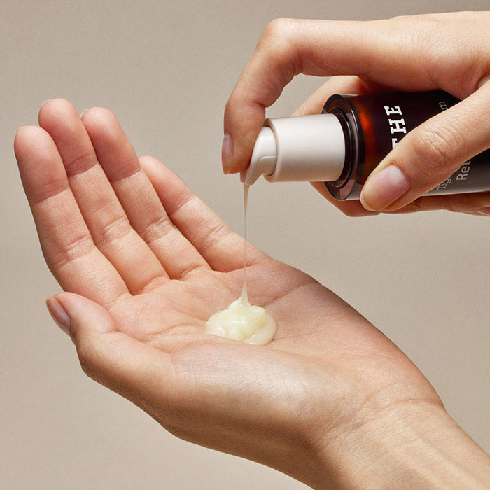 Applying BLITHE Targeted Tightening Serum Retinol 0.1 30ml onto palm for skincare routine