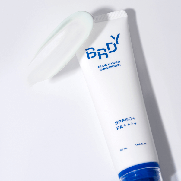 B.READY Blue Moisture Sun Cream 50ml tube and cream swatch on white background - Gentleman Korea SPF50+ PA++++ Korean men’s sunscreen