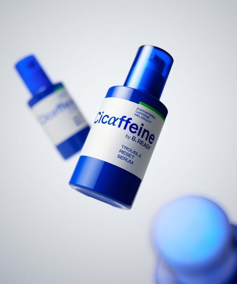 B.READY Cicaffein trouble Reset Serum 40ml floating product shot for men by Gentleman Korea, blue bottle showing label and pump