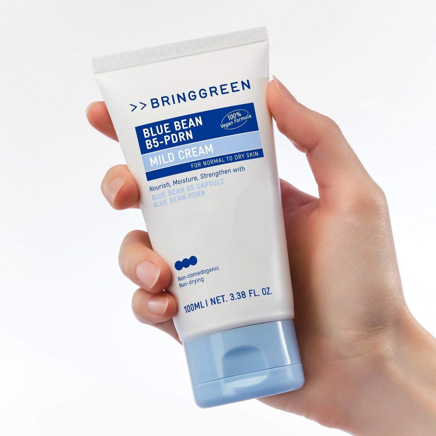 BRINGGREEN Blue Bean B5-PDRN Mild Cream 100ml in hand showing product packaging and size