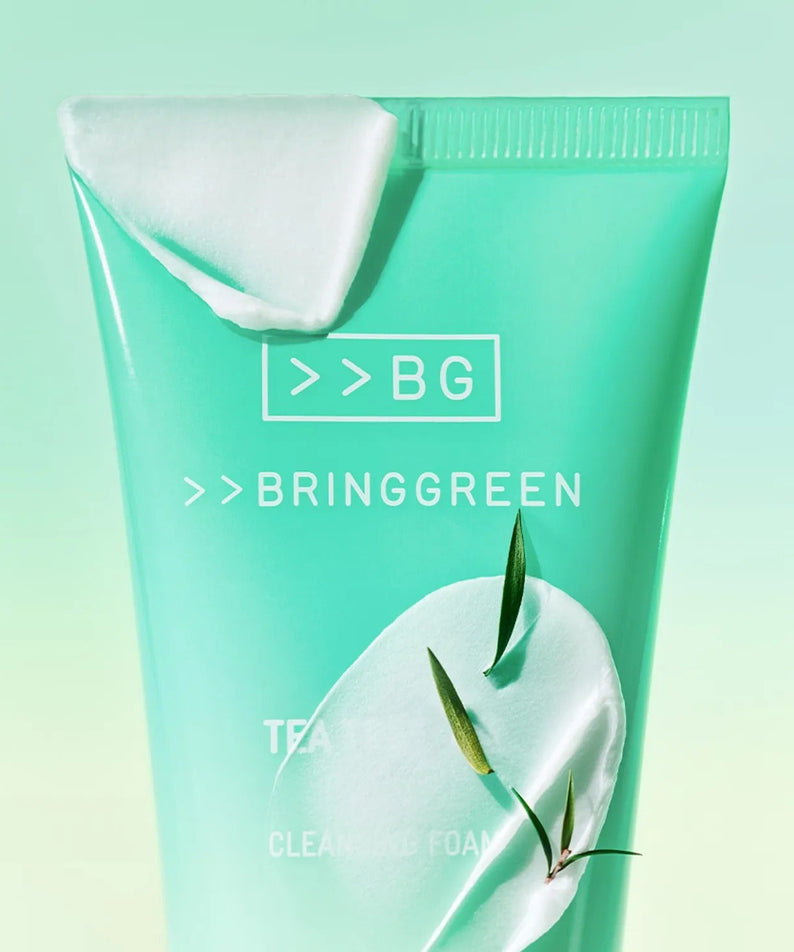 BRINGGREEN Tea Tree Cica Deep Cleansing Foam 120ml tube on a gradient green background with leaves