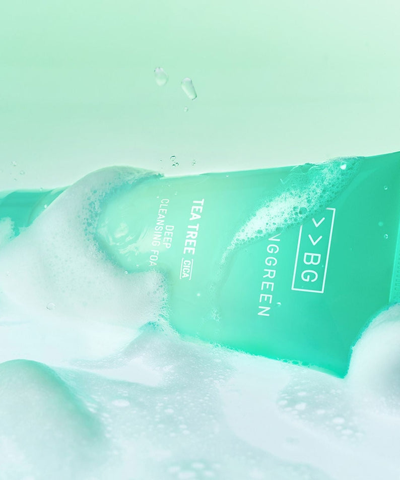 BRINGGREEN Tea Tree Cica Deep Cleansing Foam 120ml surrounded by cleansing bubbles, ideal for deep skin purification.