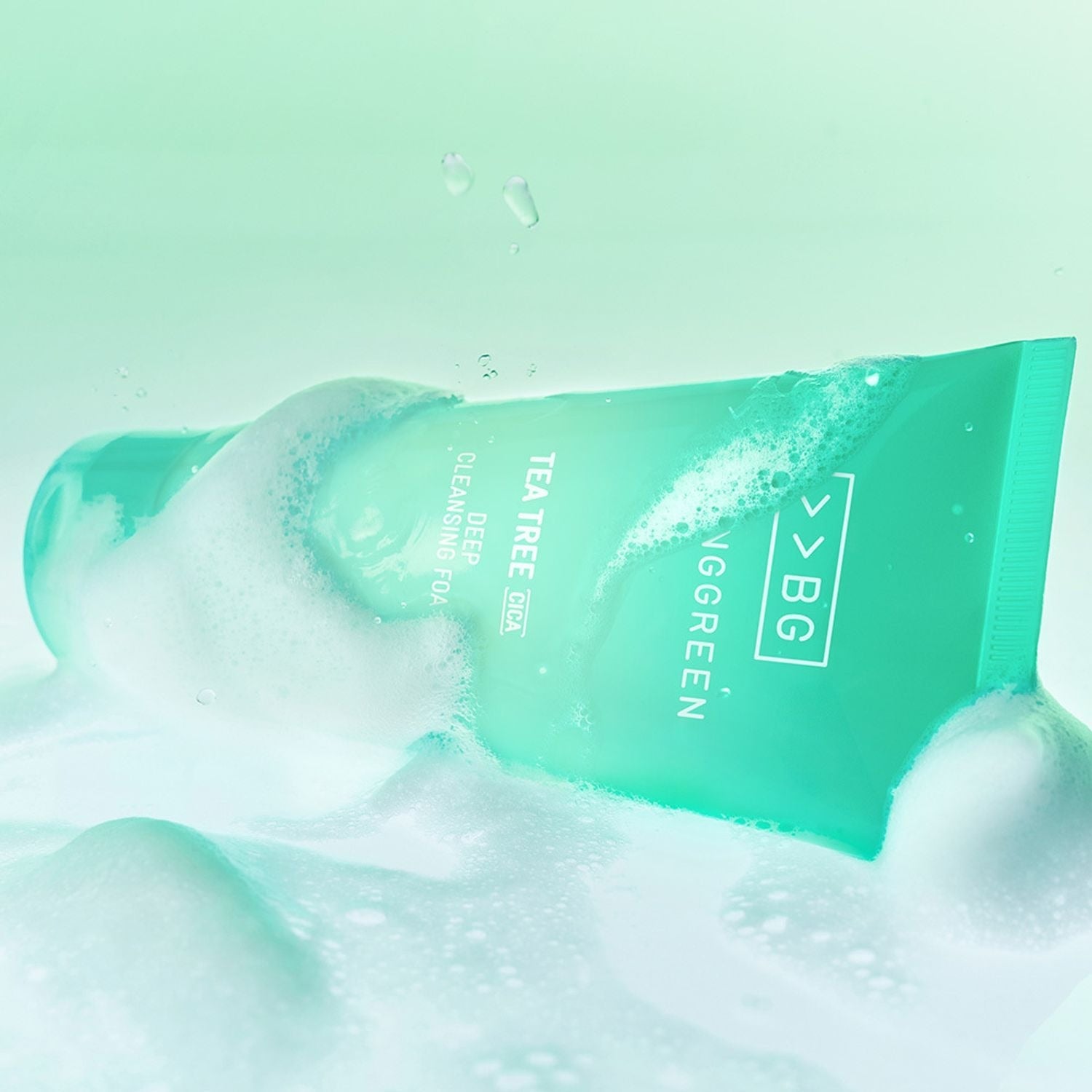 BRINGGREEN Tea Tree Cica Deep Cleansing Foam 120ml surrounded by cleansing bubbles, ideal for deep skin purification.