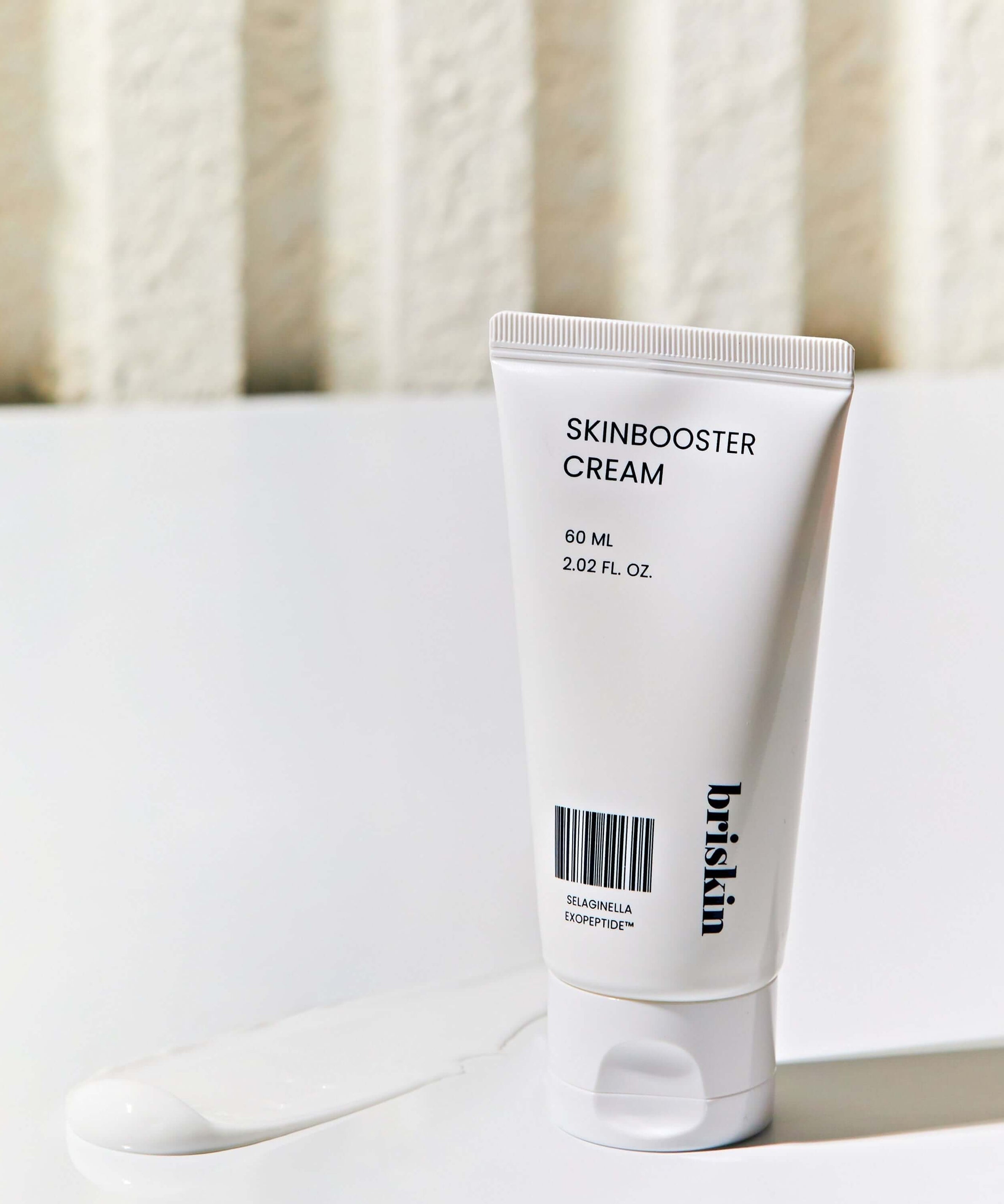 BRISKIN Selaginella Exopeptide Skin Booster Cream 60ml on white background with product texture visible