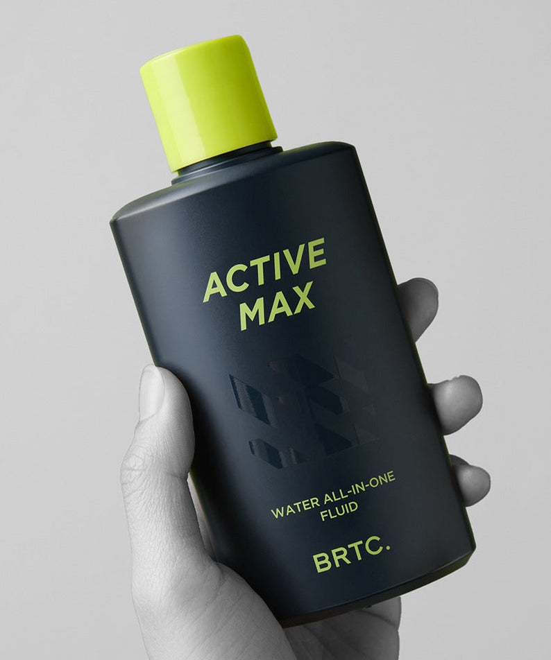 Gentleman Korea product shot of BRTC Homme Active Max Water All-in-One Fluid 150ml held in hand, men's Korean skincare for gentleman
