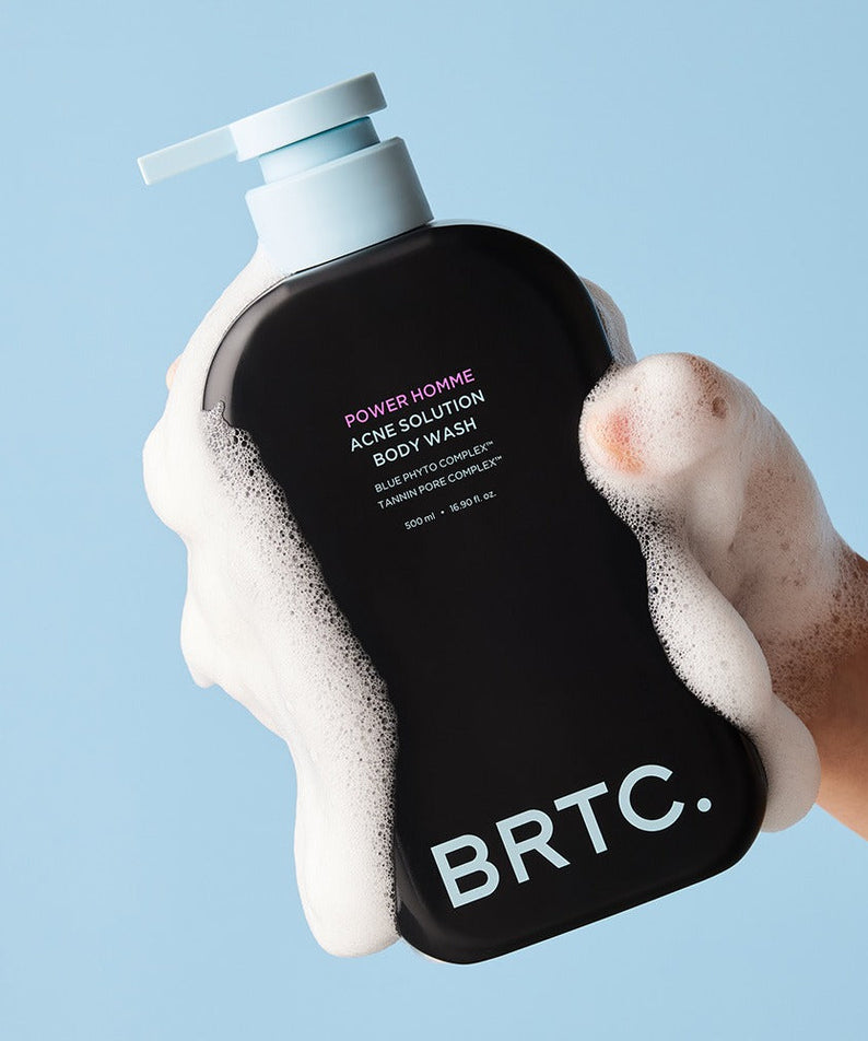 BRTC Power Homme Acne Solution Body Wash 500ml held by hand with foam - Gentleman Korea Korean men's skincare export
