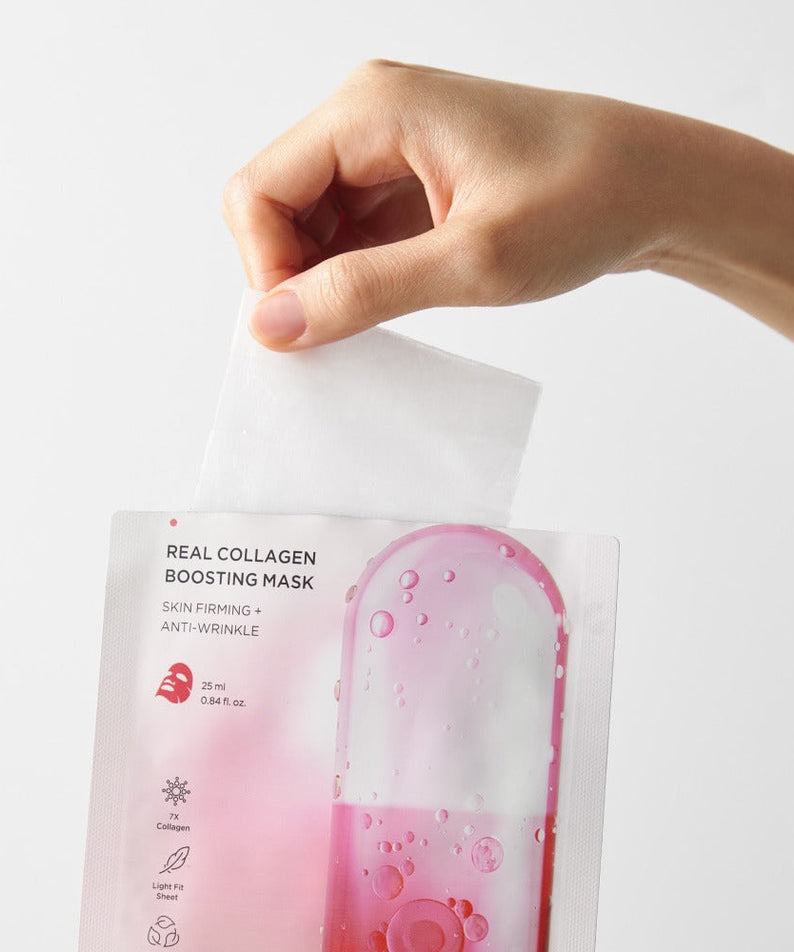 Hand holding BRTC Real Collagen Bosting Mask 10 Sheets, pink packaging for skin firming, anti-wrinkle benefits