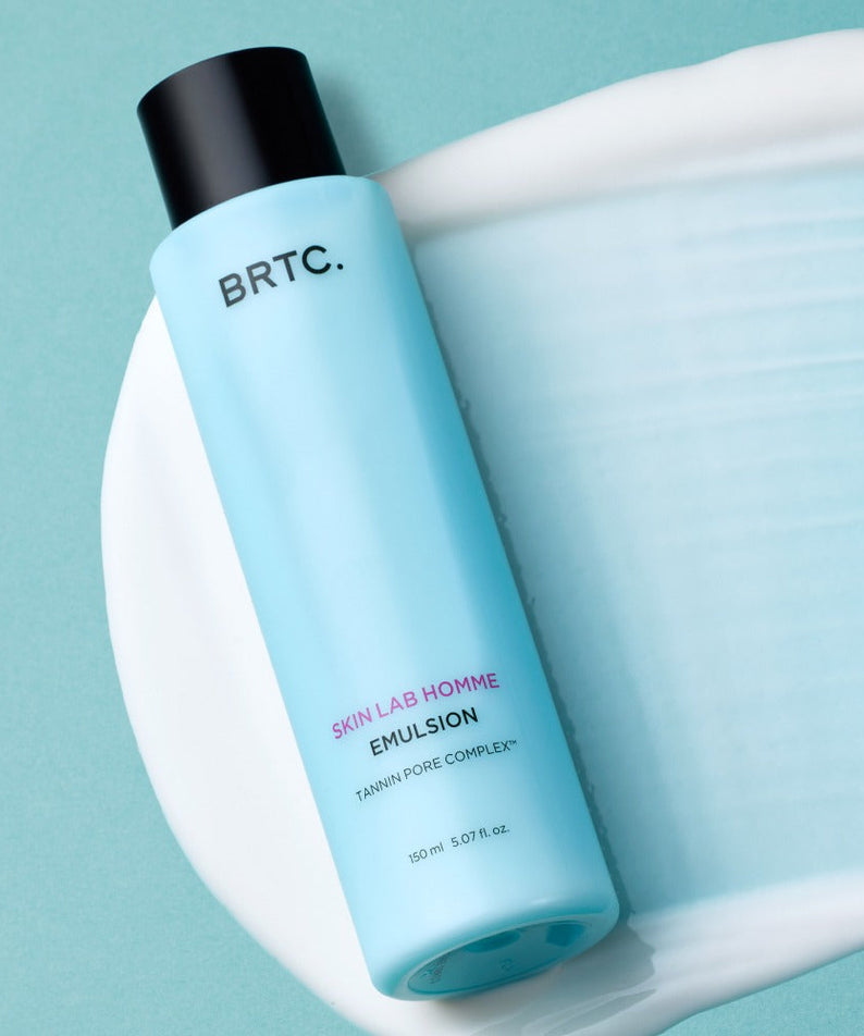 BRTC Skin Lab Homme Series Emulsion 150ml bottle on blue background with creamy texture - Gentleman Korea Korean men’s skincare