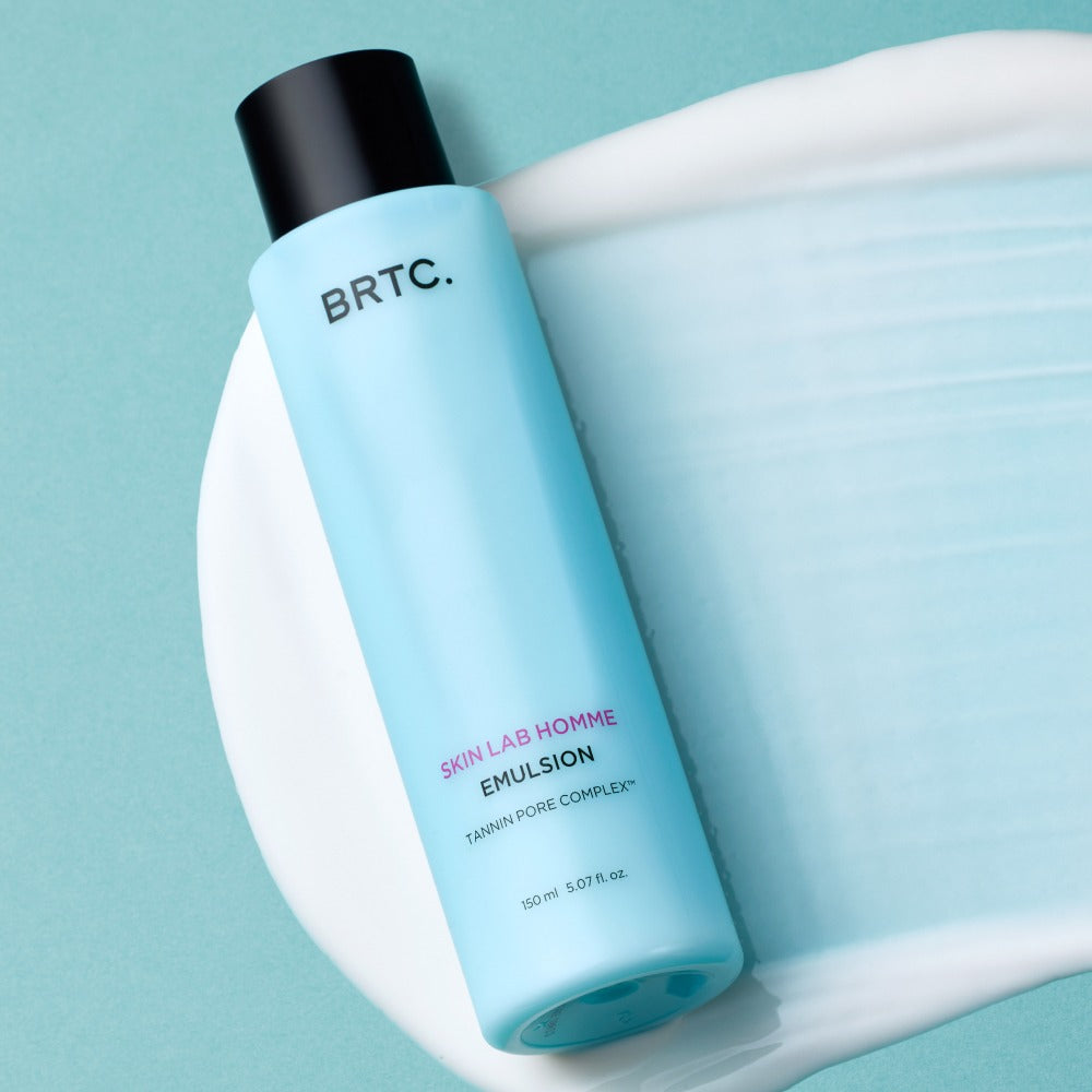 BRTC Skin Lab Homme Series Emulsion 150ml bottle on blue background with creamy texture - Gentleman Korea Korean men’s skincare