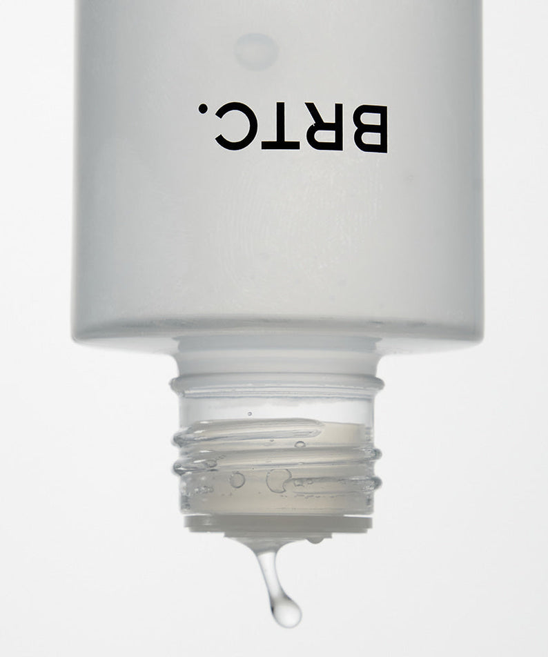 BRTC The First Essence 120ml bottle with a droplet