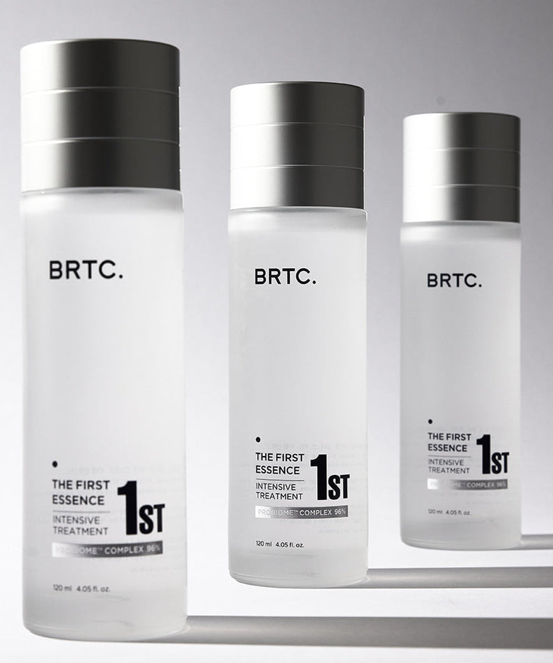 BRTC The First Essence 120ml bottles for intensive skin treatment displayed elegantly.