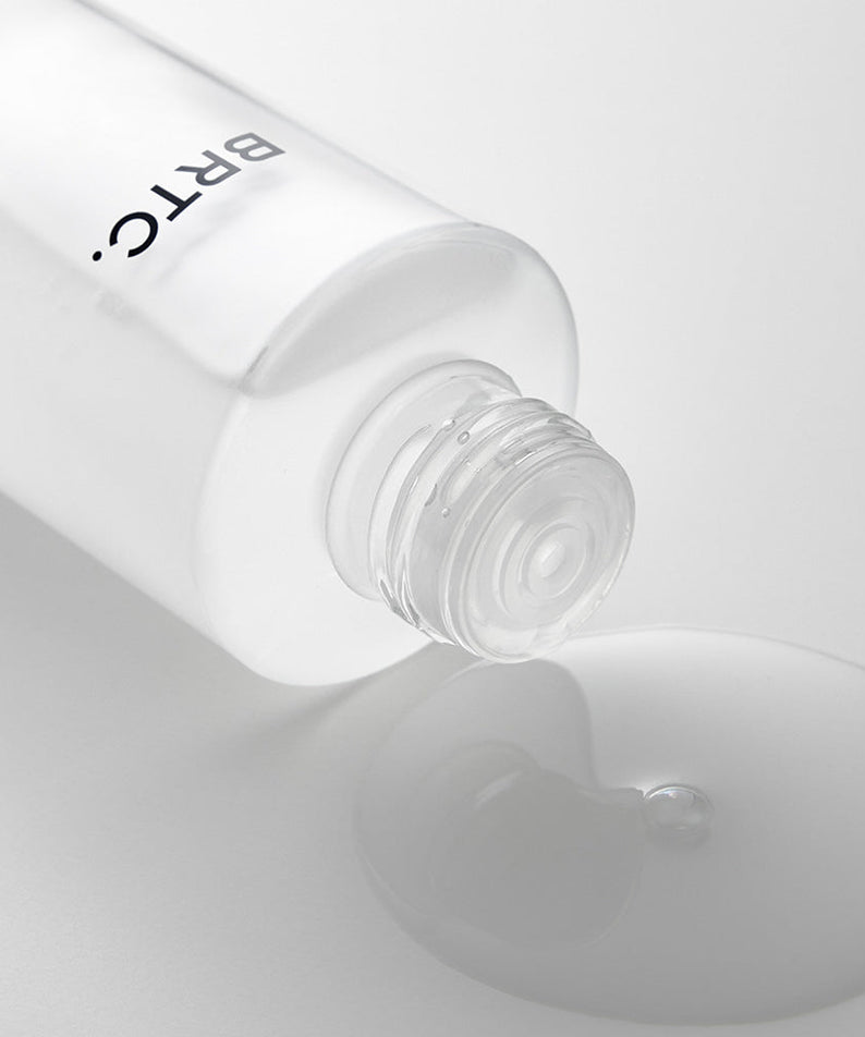 BRTC The First Essence 120ml bottle with clear liquid pouring out