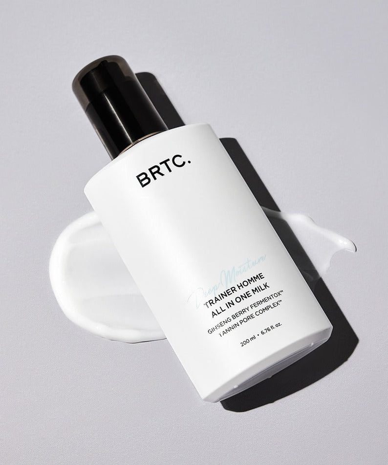 BRTC Trainer Homme ALl-in-One Milk 200ml bottle on gray background with cream swatch – Gentleman Korea Korean men’s skincare