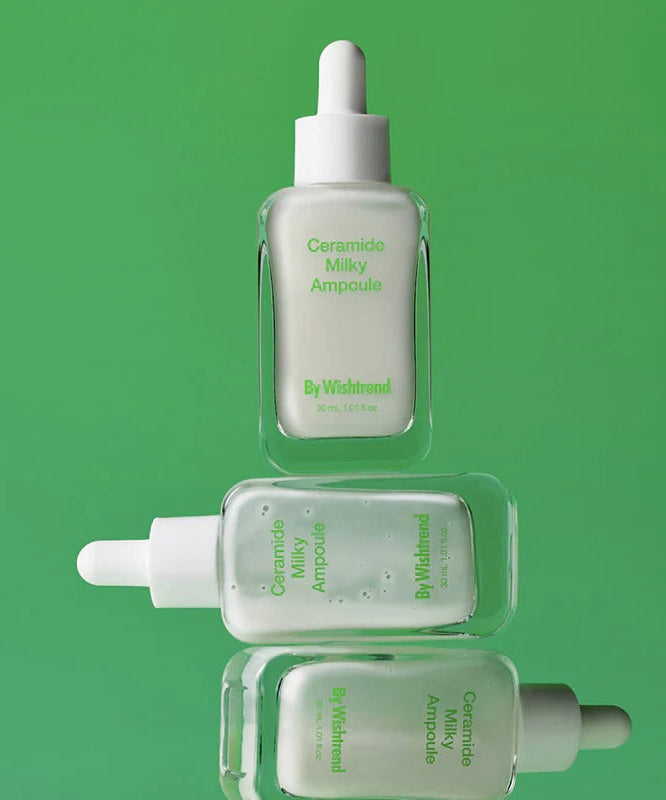 BY WISHTREND Ceramide Milky Ampoule 30ml product image with green background and glass dropper bottle.
