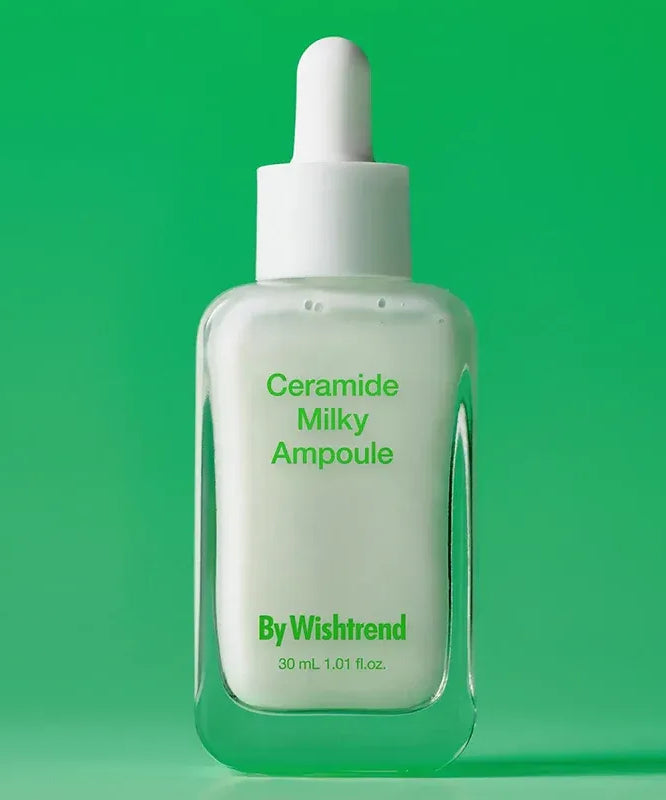 BY WISHTREND Ceramide Milky Ampoule 30ml skincare product bottle on green background