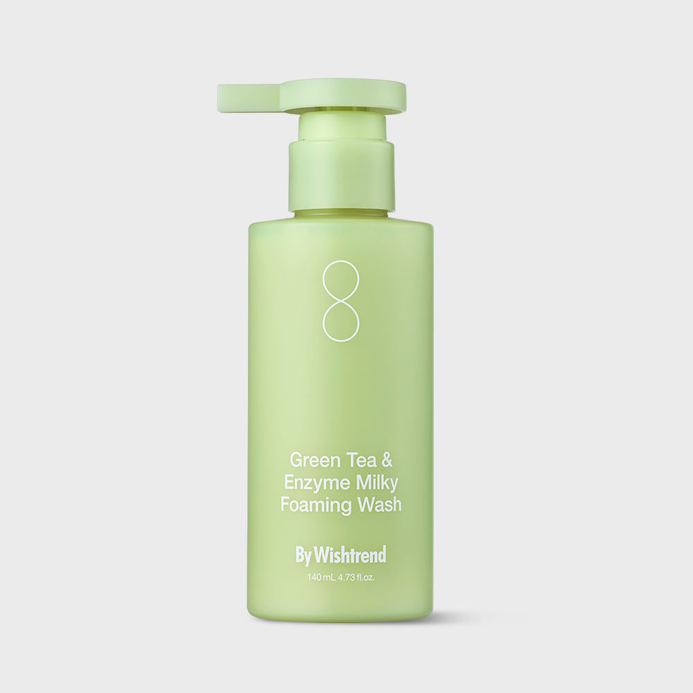 BY WISHTREND Green Tea & Enzyme Milky Foaming Wash 140ml in a light green pump bottle on a white background.