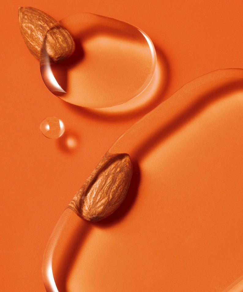 BY WISHTREND Madelic Acid Gentle Exfloliating Toner 150ml almond and liquid texture on orange background
