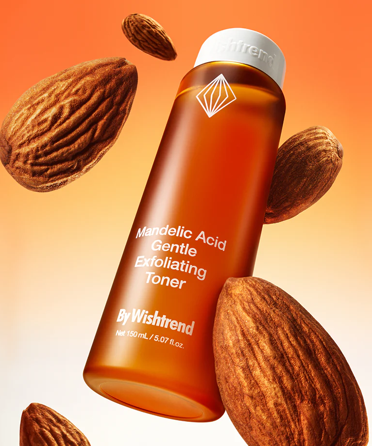 BY WISHTREND Madelic Acid Gentle Exfloliating Toner 150ml bottle with almonds on orange gradient background