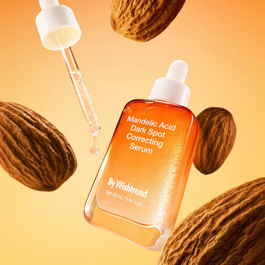 BY WISHTREND Mandelic Acid Dark Spot Correcting Serum 30ml bottle with dropper and almonds background