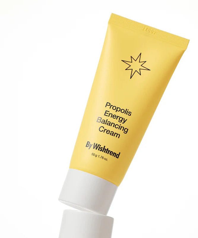 BY WISHTREND Propolis Energy Balancing Cream 50g in yellow tube with white cap on white background