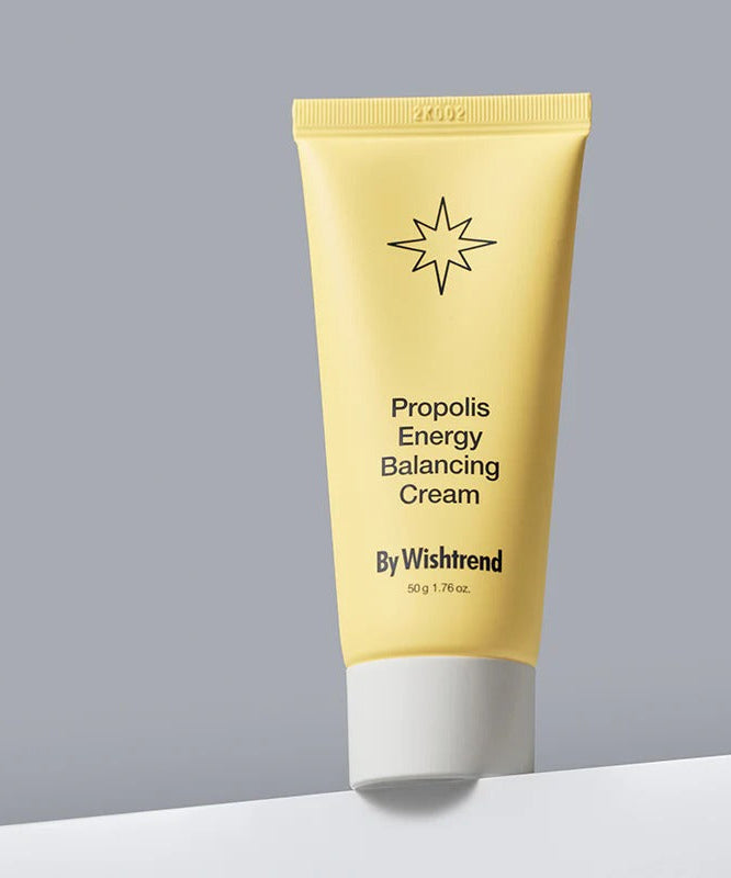 BY WISHTREND Propolis Energy Balancing Cream 50g in yellow tube on gray background