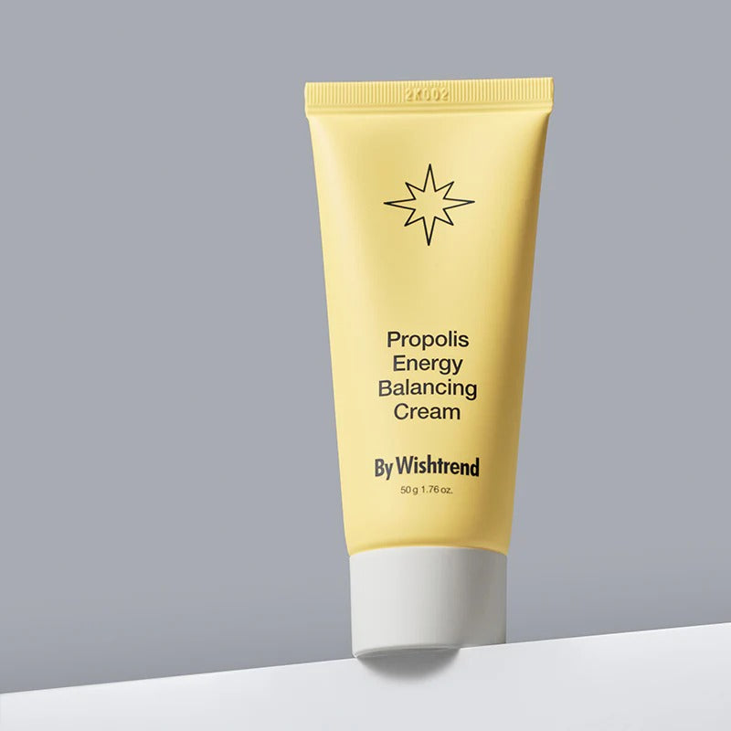 BY WISHTREND Propolis Energy Balancing Cream 50g in yellow tube on gray background