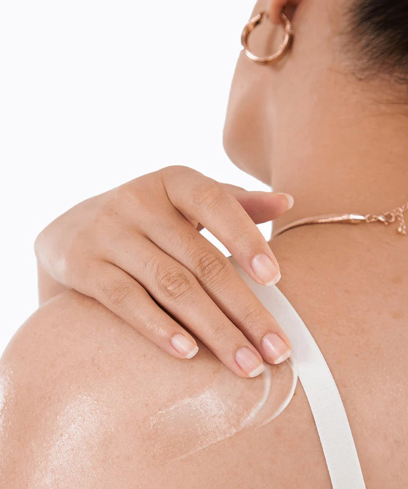 Applying BY WISHTREND Vitamin A-mazing Bakuchiol Body Lotion 150g on shoulder for smooth skin
