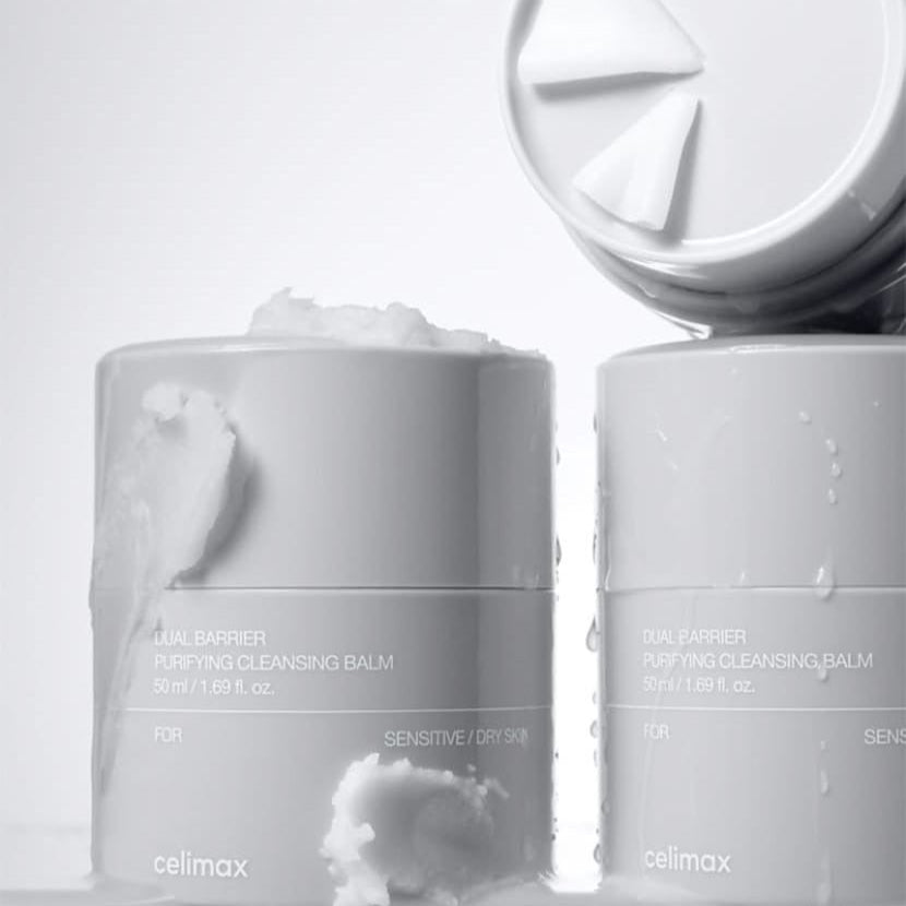 CELIMAX Dual Barrier Purifying Cleansing Balm 50ml in sleek gray jars with cream scoops on top.