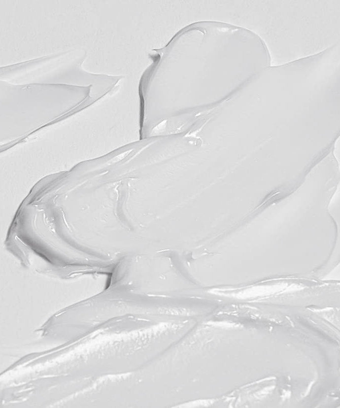 Texture of CELIMAX Dual Barrier Skin Wearable Cream 50ml showcasing its rich, creamy consistency for effective skin barrier protection.