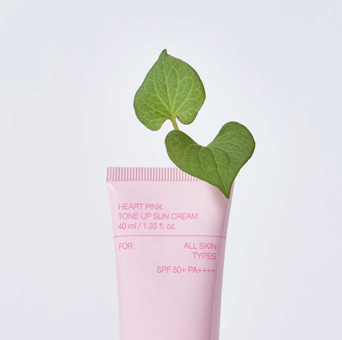 CELIMAX Heart Pink Tone-up Sun Cream 40ml with green leaf design on white background.
