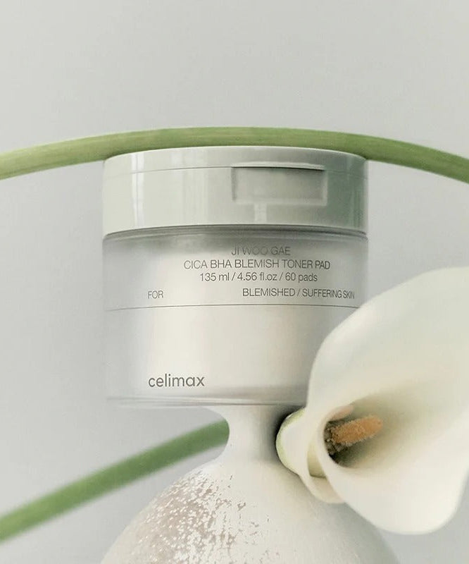 CELIMAX Ji Woo Gae Cica BHA Blemish Toner Pad 60 pads displayed with floral background