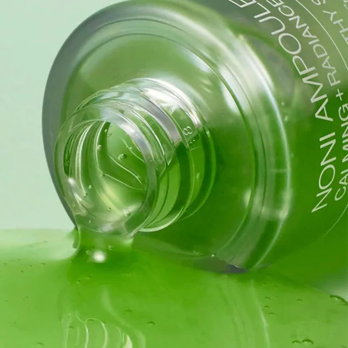 CELIMAX Noni Ampoule Calming+Radiance 30ml product shot with green liquid