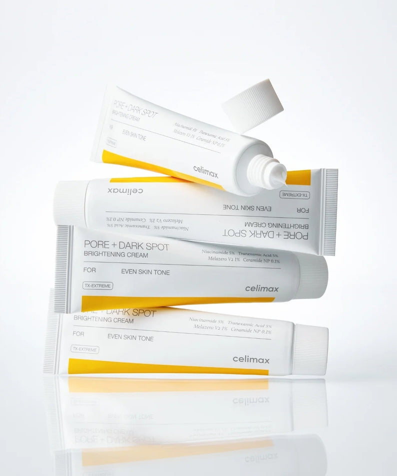 CELIMAX Pore Dark Spot Brightening Cream 35ml tubes stacked on a reflective surface.