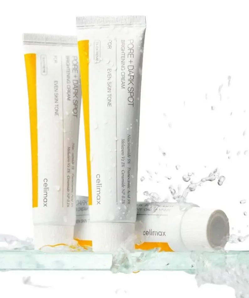 CELIMAX Pore Dark Spot Brightening Cream 35ml tubes with water splash enhancing the skincare product's features.