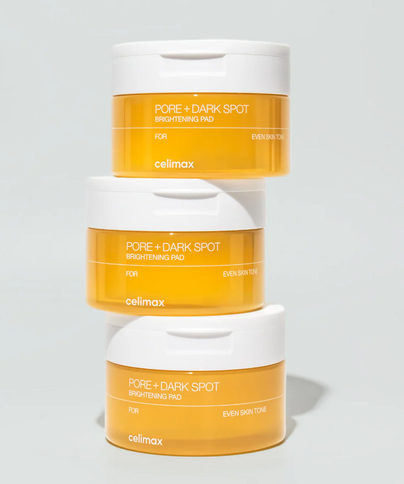 Stacked containers of CELIMAX Pore Dark Spot Brightening Pad 40ea for even skin tone