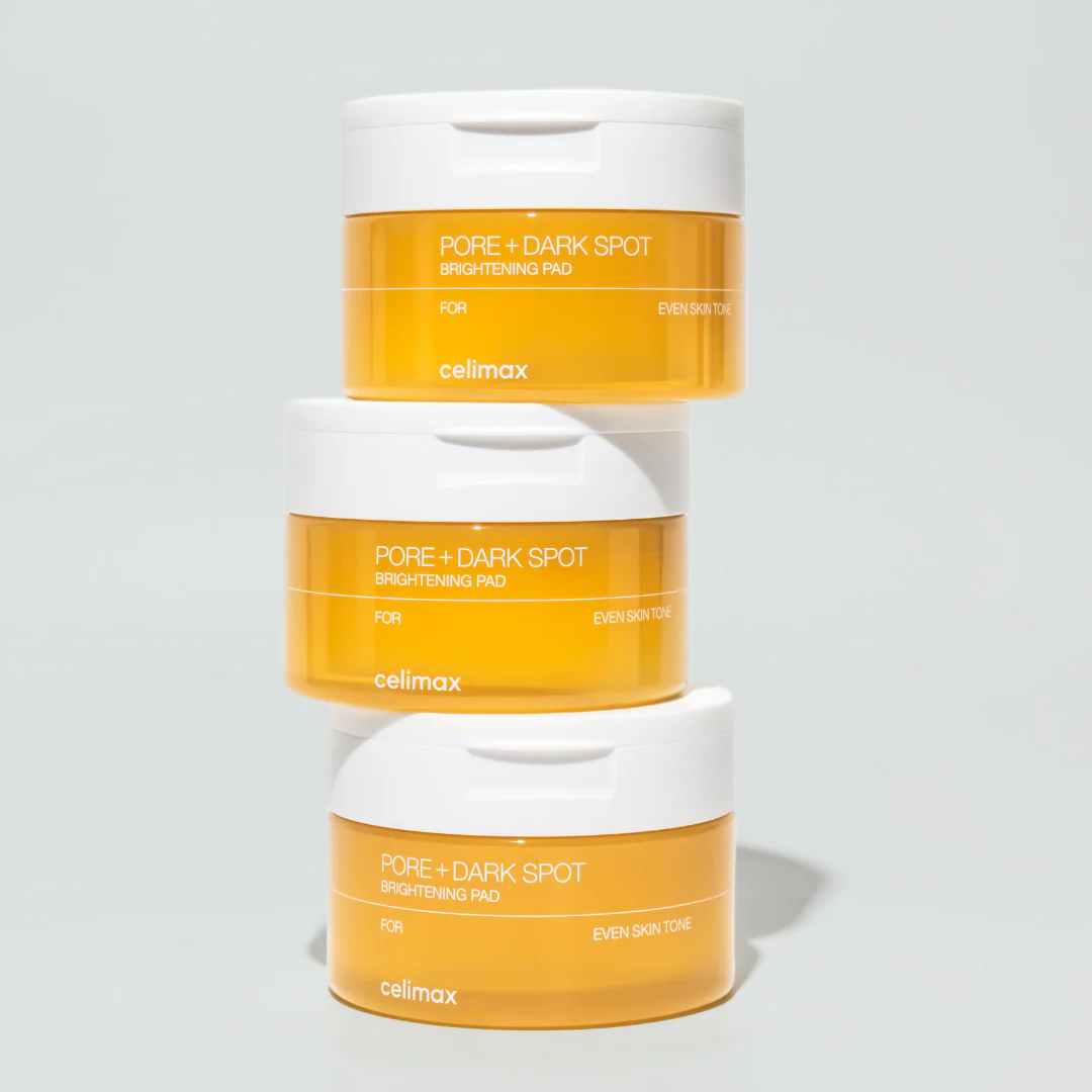 Stacked containers of CELIMAX Pore Dark Spot Brightening Pad 40ea for even skin tone