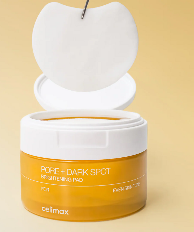 CELIMAX Pore Dark Spot Brightening Pad 40ea open jar with pad on yellow background for even skin tone
