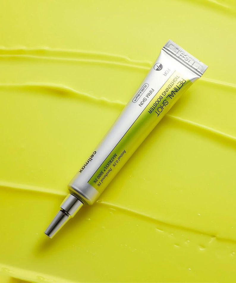 CELIMAX Retinol Shot Tightening Booster 15ml against a textured yellow background