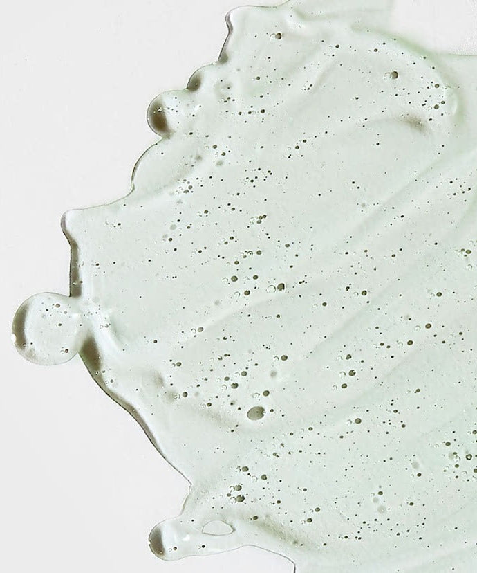 Texture of CELIMAX The Real Cica Nicinamide AC Calming Seru 40ml skincare product with a calming formula.