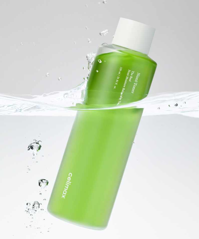 CELIMAX The Real Noni Moisture Balancing Toner 320ml in water, green bottle, skincare product image.