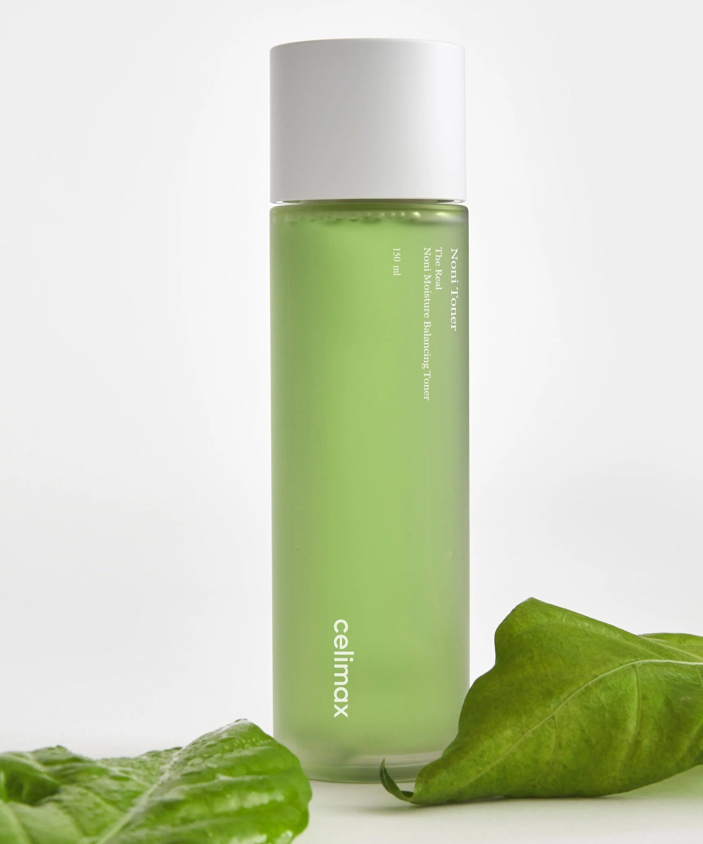 CELIMAX The Real Noni Moisture Balancing Toner 320ml bottle with green leaves